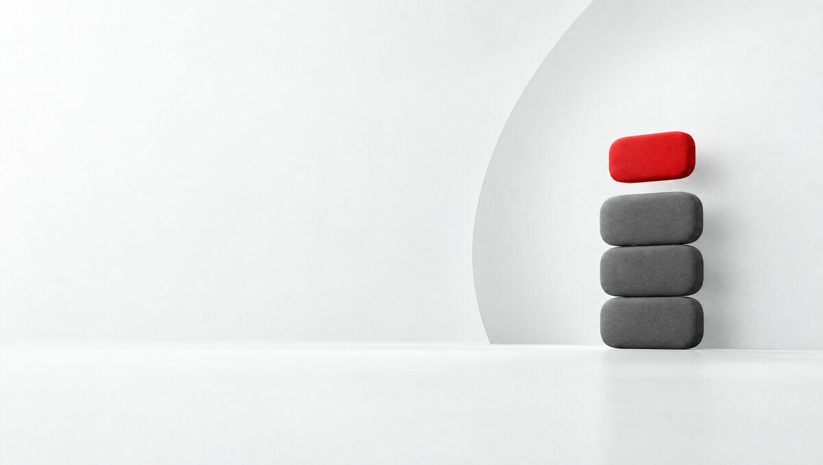 Ilustración abstracta: bloques grises apilados con uno rojo